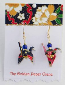 Paper Crane earrings flowers on dark blue background